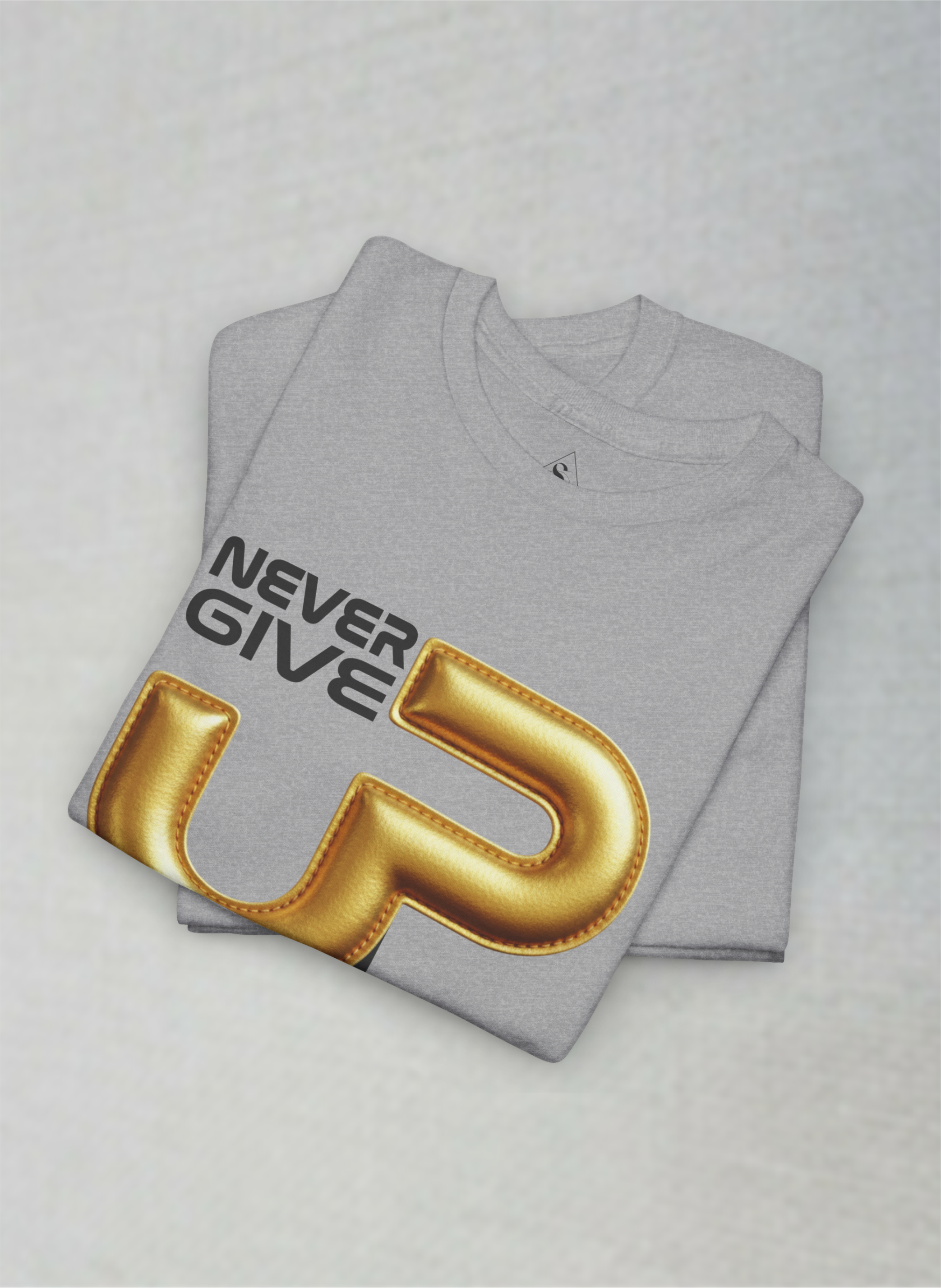 Never Give Up – Premium Gold Motivation Unisex Heavy Cotton Tee